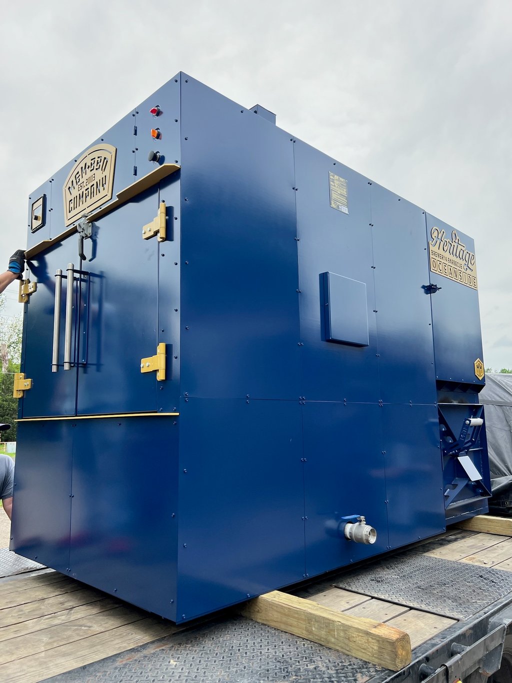 Blue MM1000 rotisserie smoker, side view