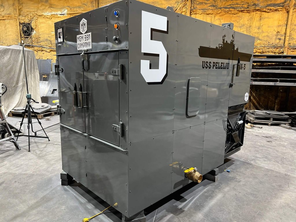 Gray MM1000 rotisserie smoker with a USS Peleliu ship graphic and the number 5