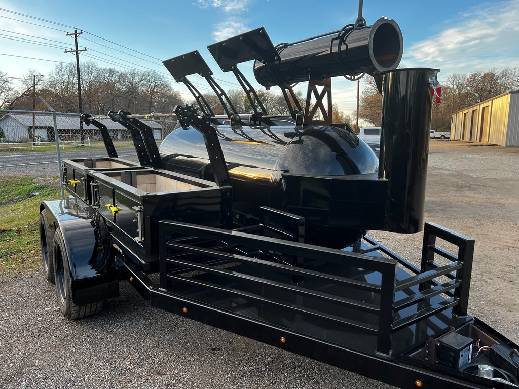 Black OS500 offset smoker with its counterweighted doors raised