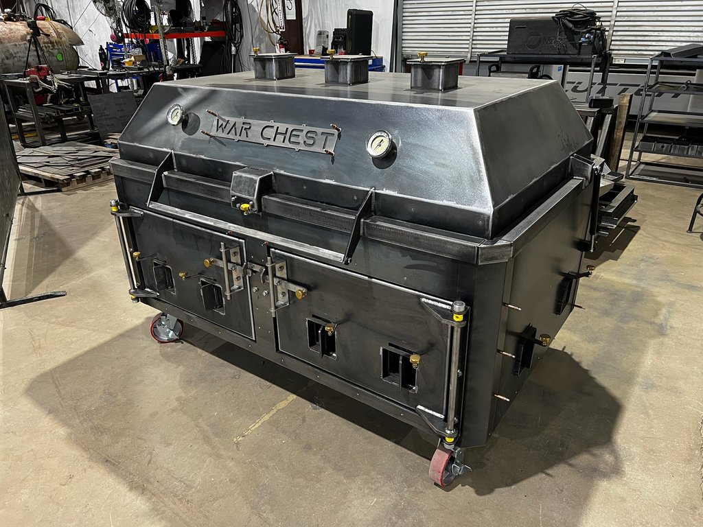 War Chest direct heat cooker from the side, showing the lid gauges