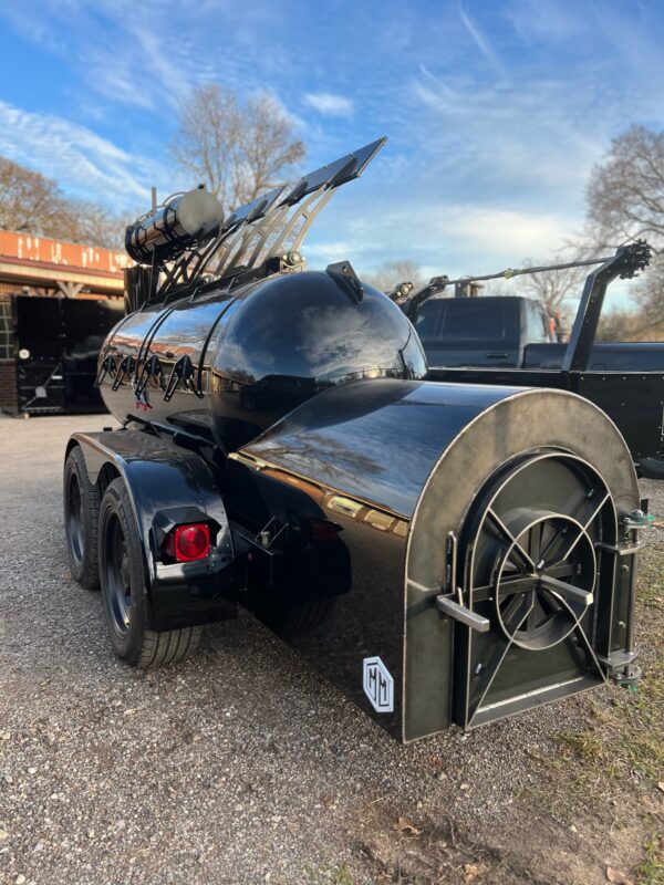 Black 500 gallon offset on trailer with double El Nino grill
